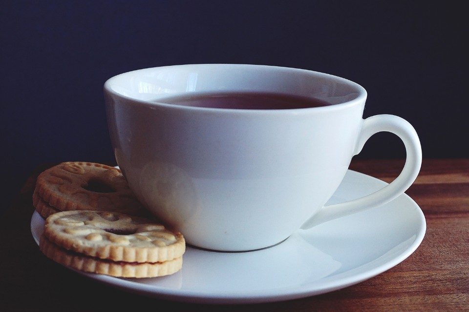 Cup of tea with a biscuit